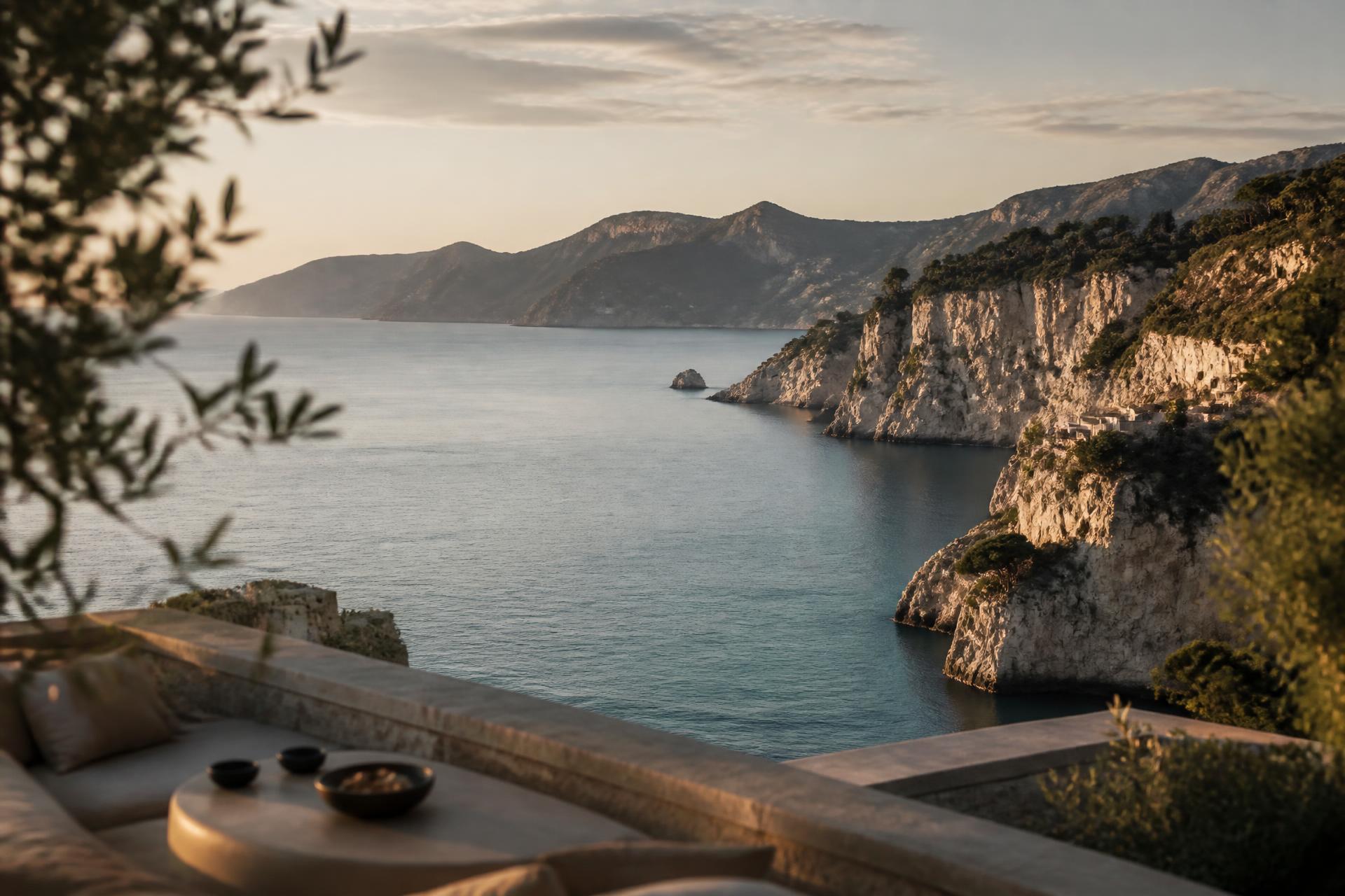 Mediterranean coastline at golden hour seen from a villa terrace